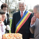 Prince Charles, Prince of Wales is offered bread and salt before a tour of the Roma village of Vizuresti on the third day of his nine day European tour on March 31, 2017 in Bucharest, Romania, which is not actually Transylvania, but he is eating. Photo via Getty Images.